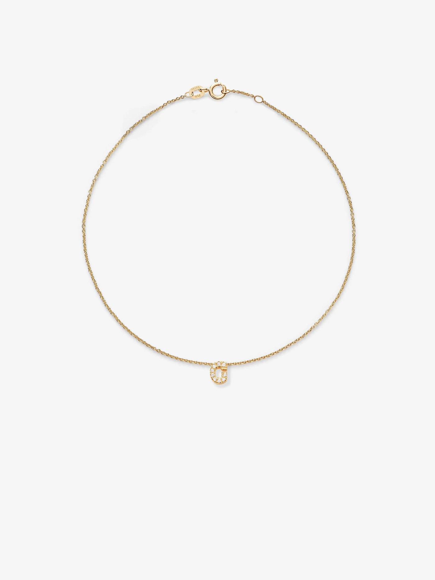 A delicate 18k solid gold bracelet featuring the letter 'G' adorned with round brilliant diamonds. The bracelet, with a simple clasp closure, showcases the radiant diamond-studded pendant centrally against a plain white background.