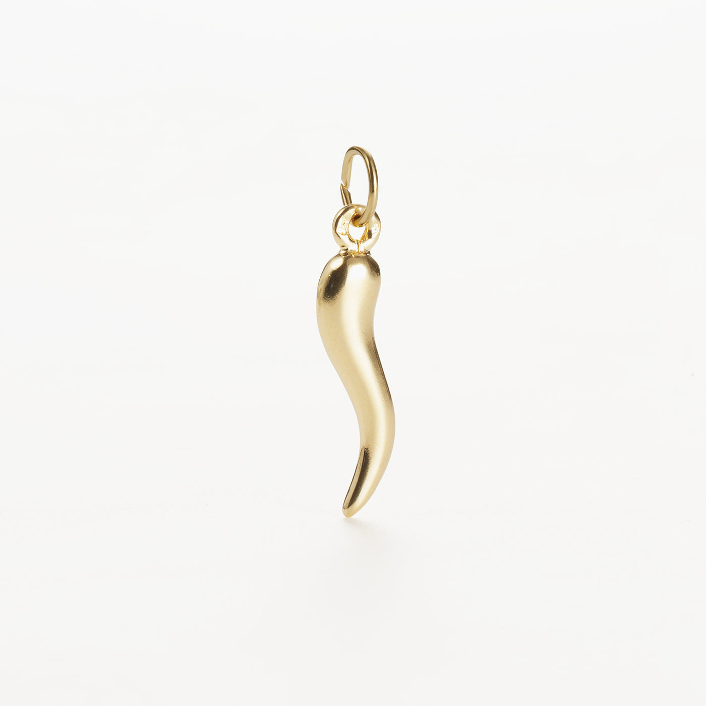 A large, 9k gold pendant in the shape of a curved chili pepper, styled as a horn of plenty charm, displayed against a plain white background. The charm features a smooth surface and has a small loop at the top for attaching to necklaces or bracelets. Dimensions are approximately 21 mm x 6 mm.

