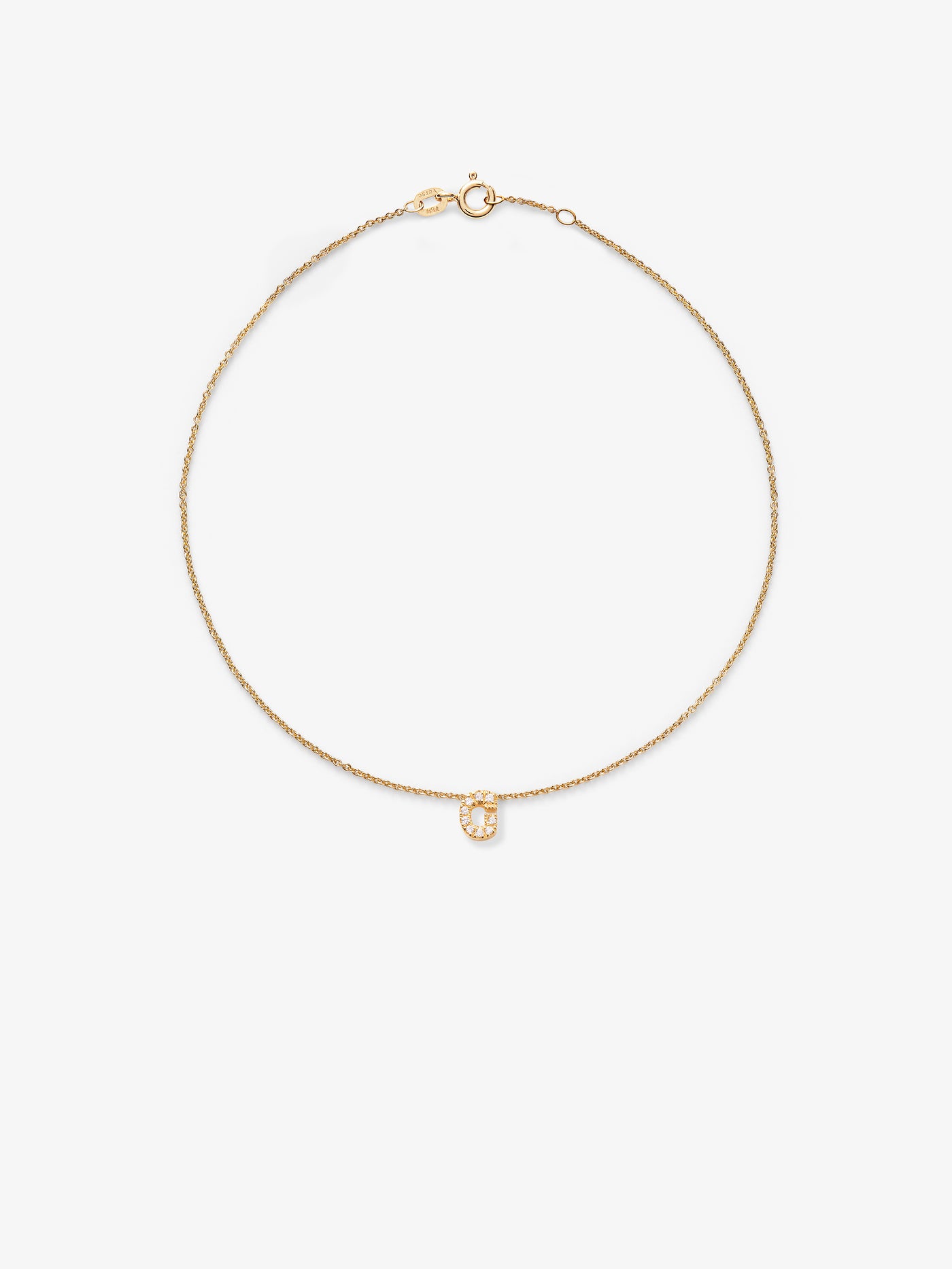 A delicate 18k solid gold bracelet featuring the letter 'G' adorned with round brilliant diamonds. The bracelet, with a simple clasp closure, showcases the radiant diamond-studded pendant centrally against a plain white background.