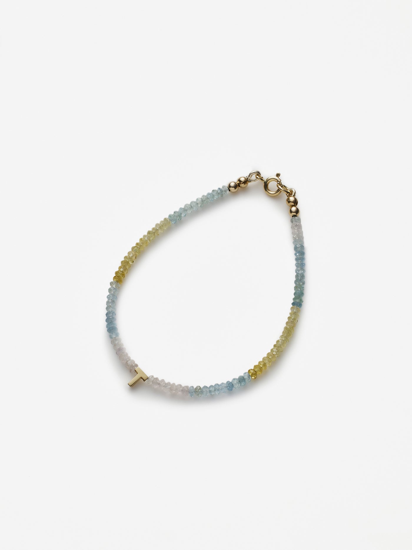 Verse-Fine-Jewellery-Shaded-Aquamarine-18k-Gold-Letter-Bracelet.V2jpg
