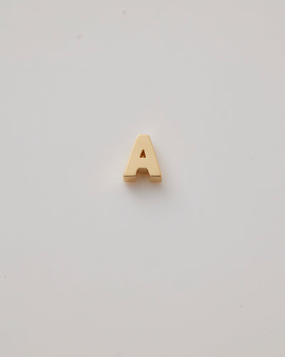 Small gold polished three-dimensional letter 'A' charm with a smooth finish, designed to thread onto a necklace chain.